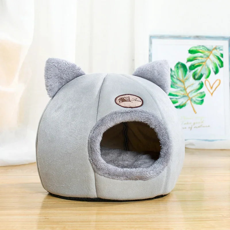 Gray cat cave bed with plush ears, cozy interior, perfect for cats and small dogs