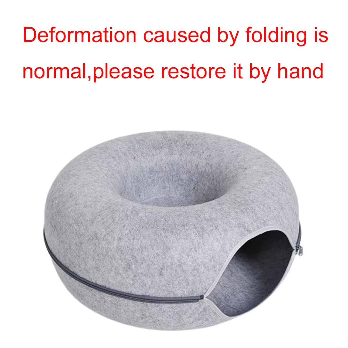 Gray felt donut-shaped pet bed with cozy cave entrance for cats and dogs