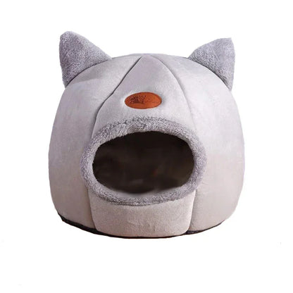 Cozy gray cat bed with plush ears and soft interior, perfect for cats and small dogs.