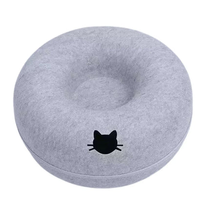 Gray donut-shaped cat bed with black cat face design, cozy pet nest for cats